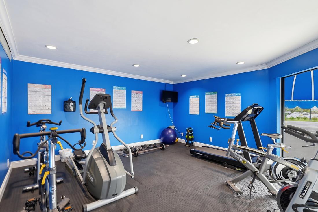 Fitness room with bikes and cardio