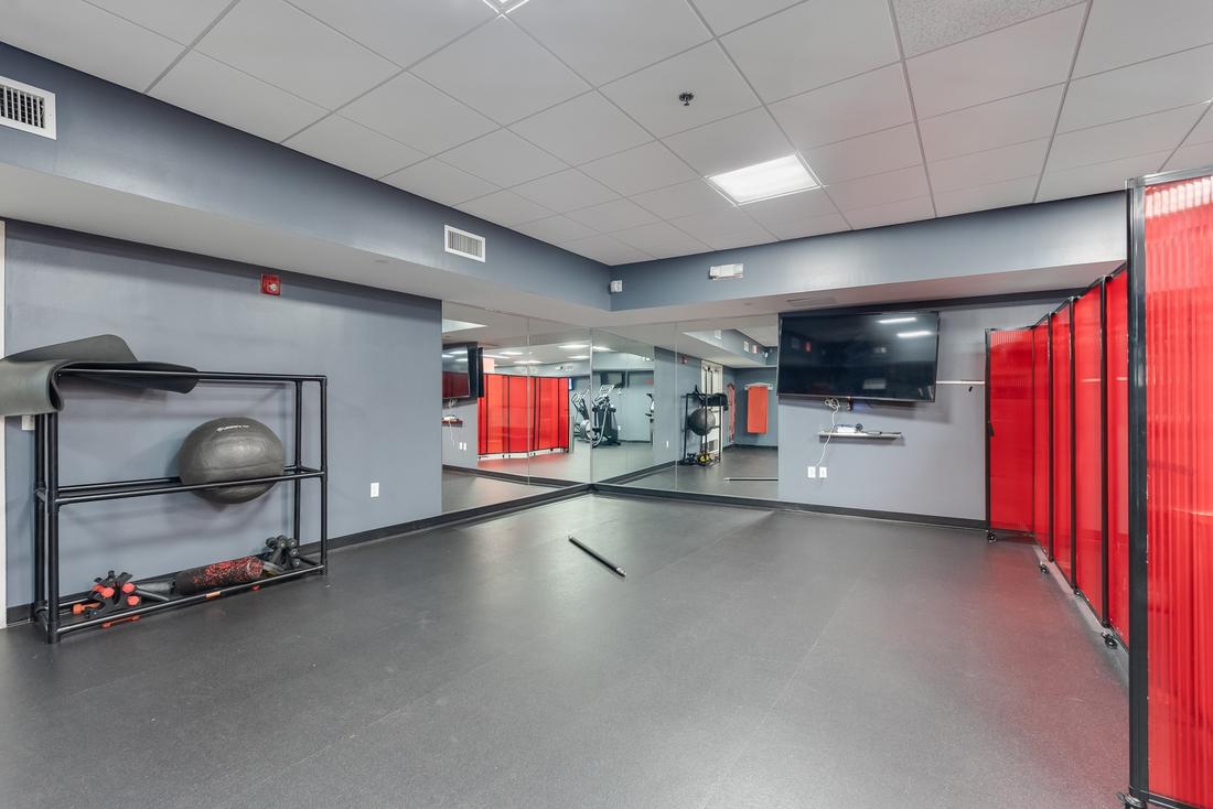 Fitness center mirror wall