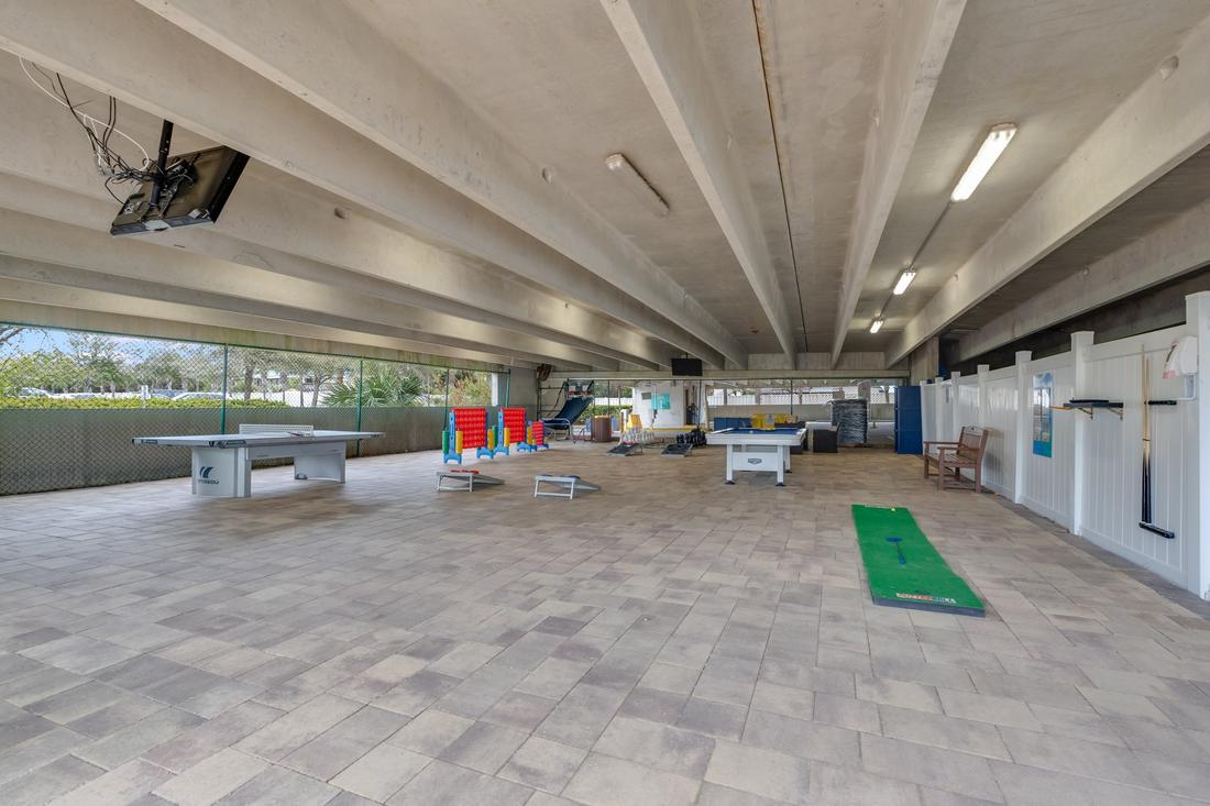 Covered putting green on the game deck