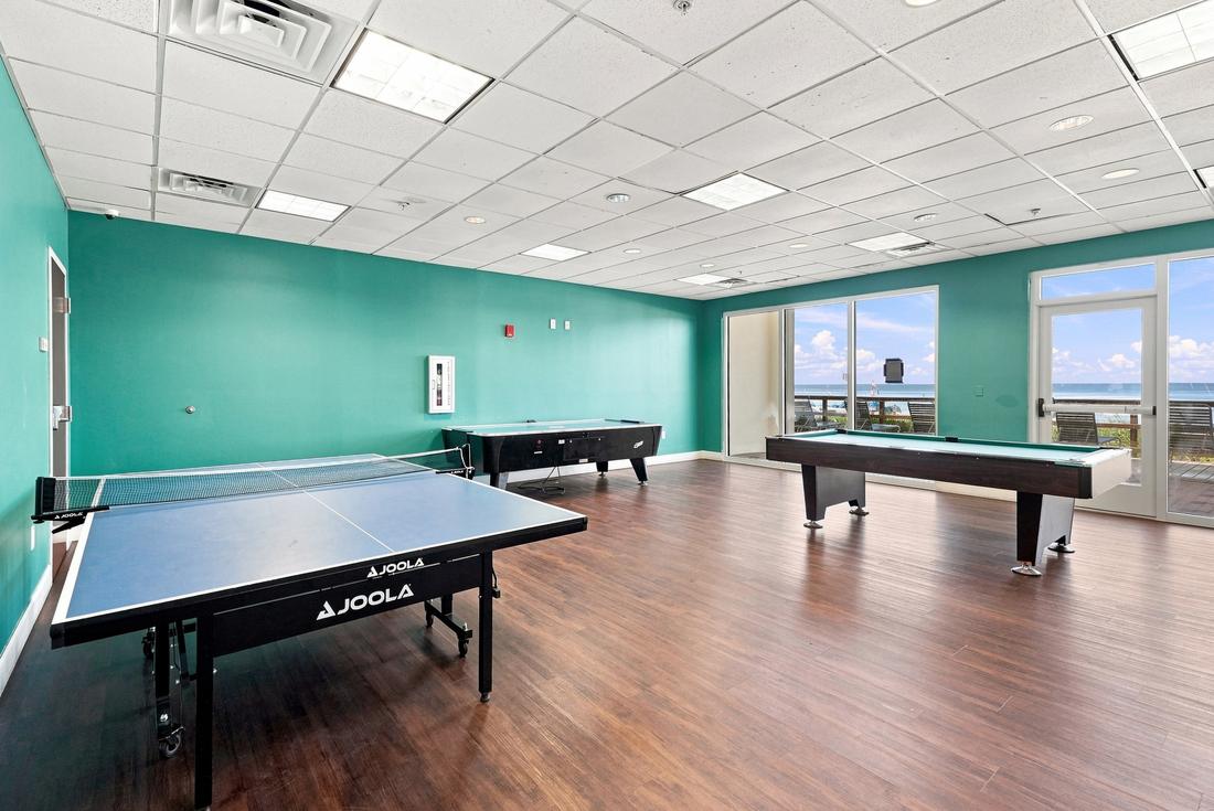 Game room with ping-pong and billiards