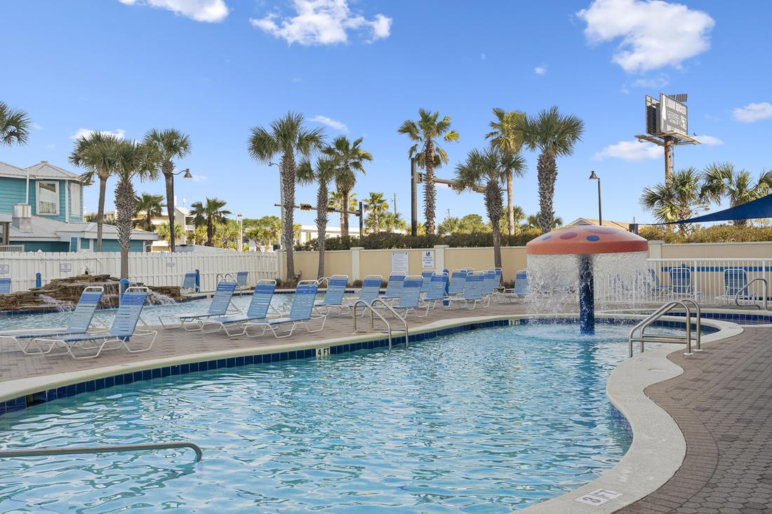 Outdoor pool with palms