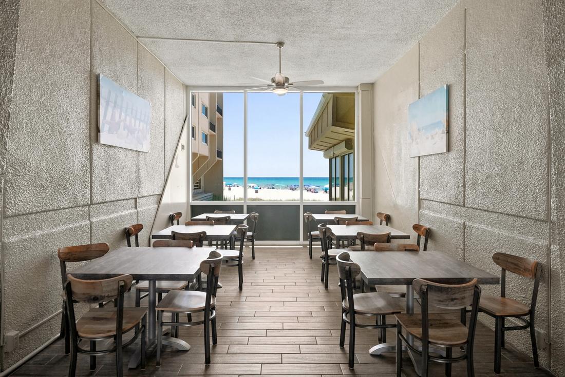 Sunset Room with Gulf-view tables