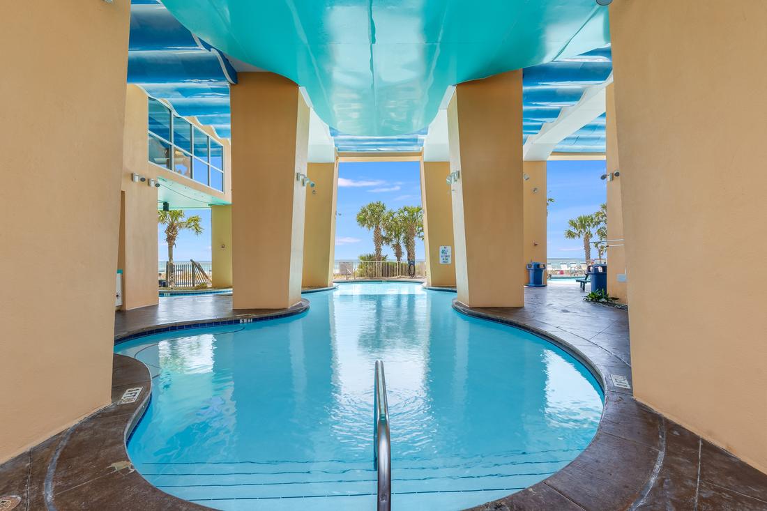 Covered pool beside the tower