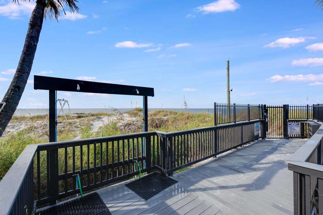 Gated beach access boardwalk