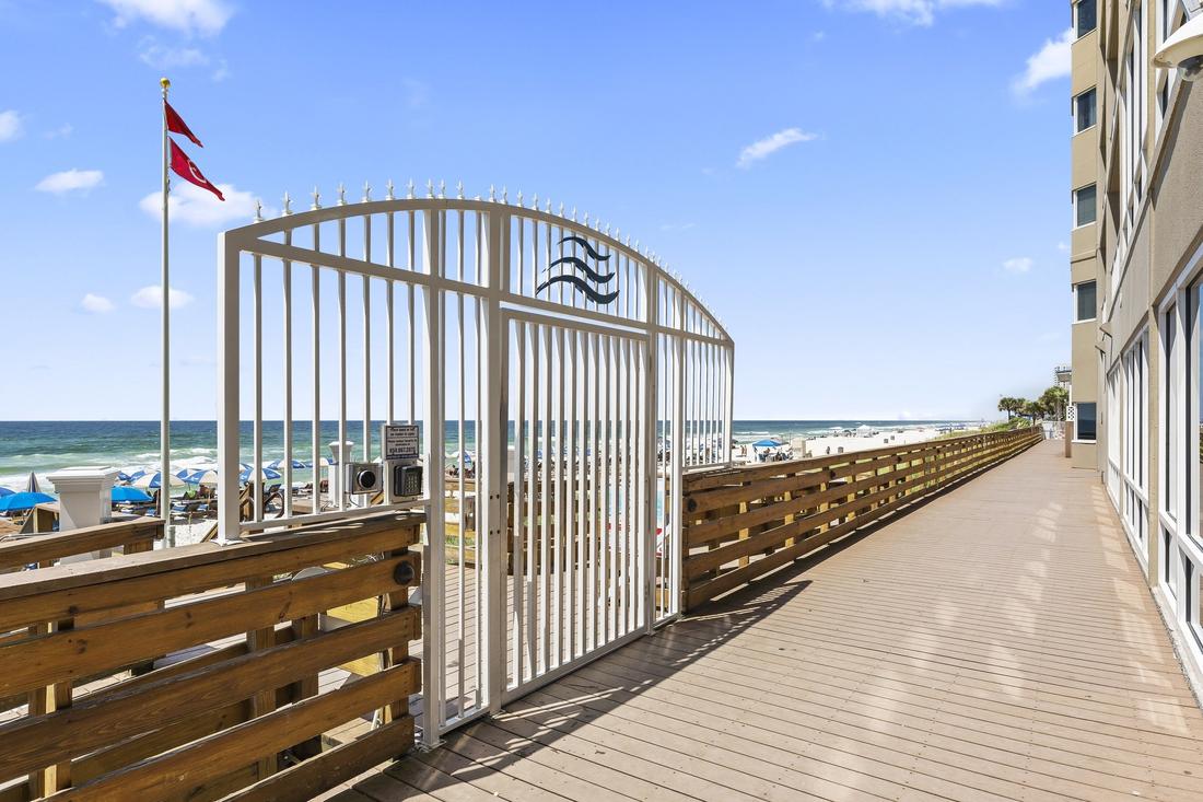 Beach access deck with flags
