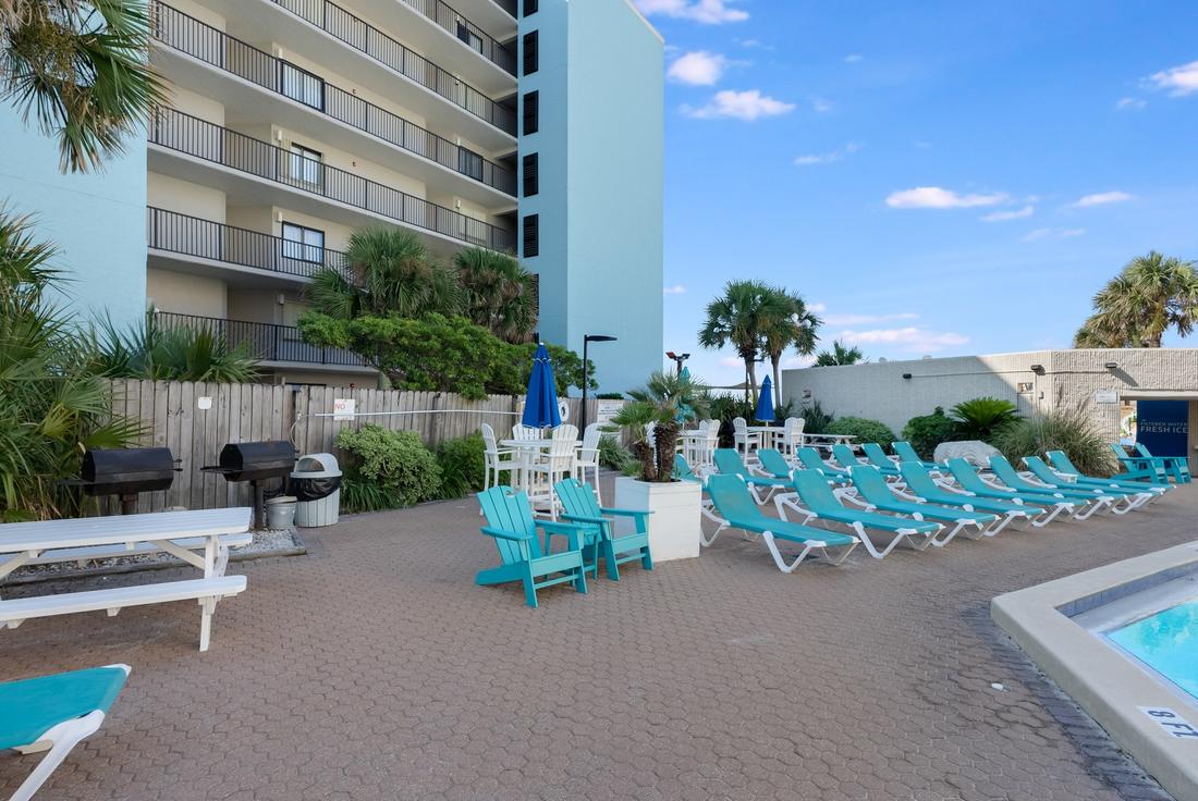 Grills and loungers by the pool