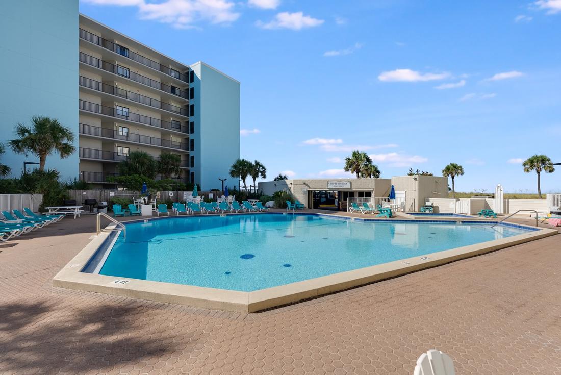 Beachfront pool beside the Top of the Gulf building